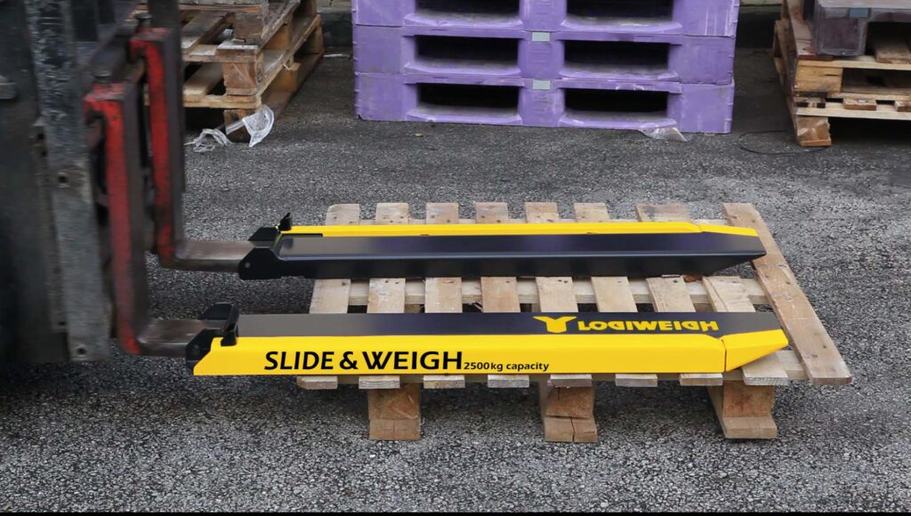 slide forks out of slide and weigh forklift weighing attachment